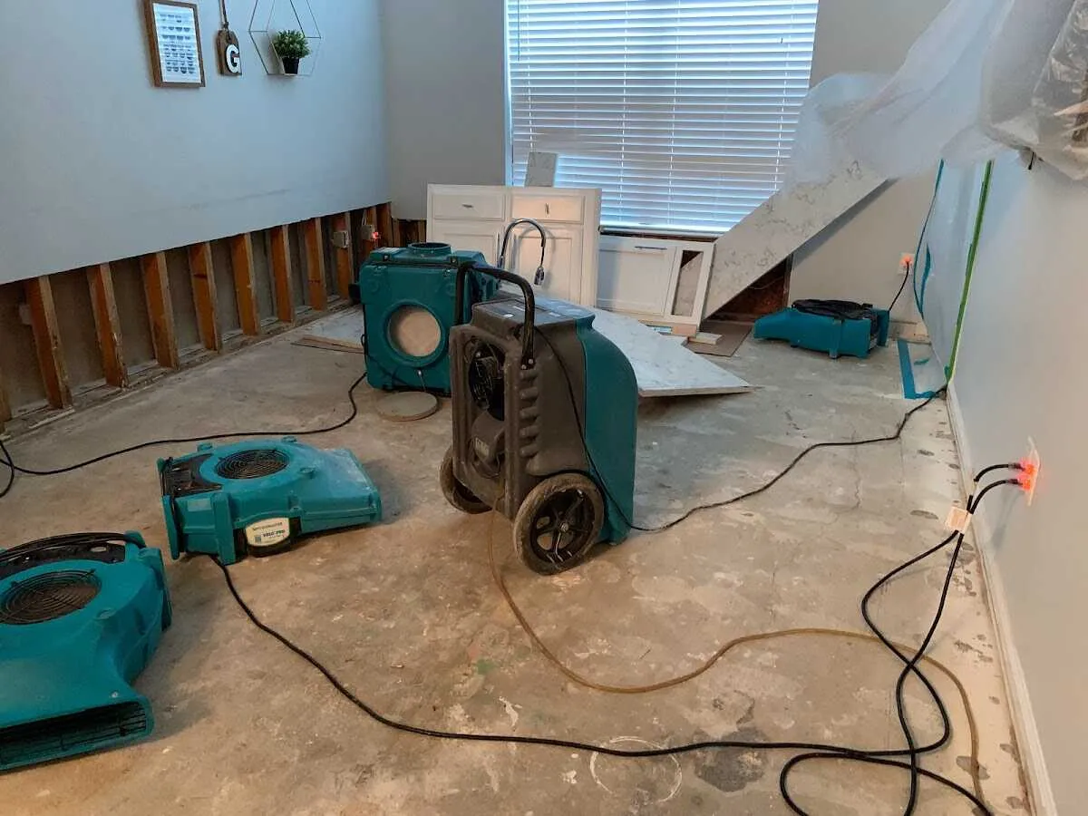 Dehumidifier in flood-cut room for Water Extraction & Removal in College Park